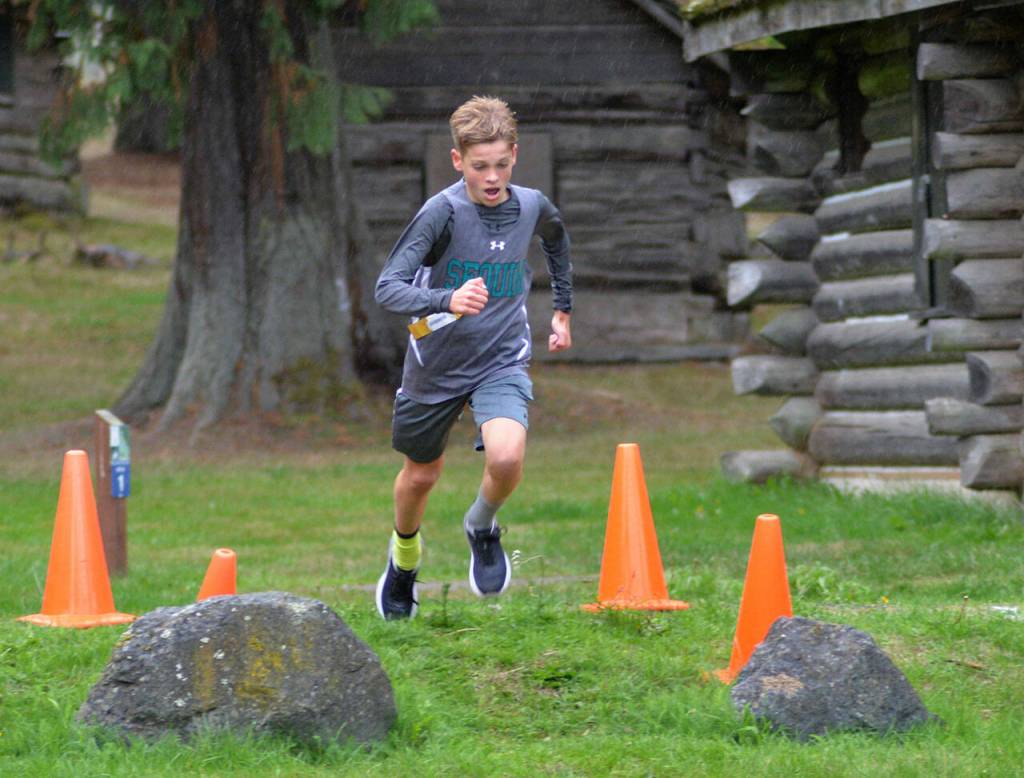 Sequims Bjorn Henrikson competes at an Olympic League meet at Lincoln Park in Port Angeles on Oct.6. Photo courtesy of Caleb Gentry