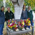 WSU Clallam County Master Gardeners Audreen Williams, Teresa Bibler, Laurel Moulton and Jan Danford receive the lifetime achievement Golden Trowel Award. Photo by Marilynn Elliott