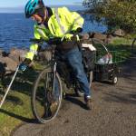 Alan Barnard helps pick up trash along the Waterfront Trail. Photo courtesy of Clallam County Sheriffs Office