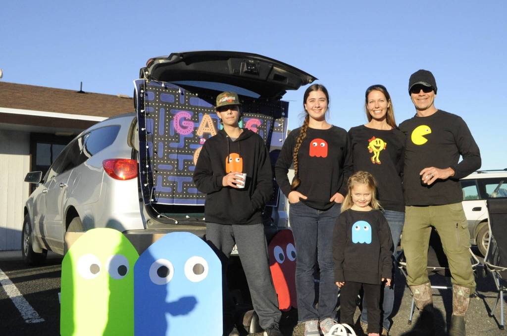 The Henry family shares their Pac Man fever at Thrive Churchs Trunk-or-Treat on Halloween, with family members, from left, Luke, 13, Haddie, 16, Lydia, 4, Kendra and Brian. Sequim Gazette photo by Matthew Nash