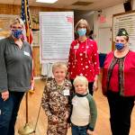 Veterans Susan Sorenson, Kathy Dobbins and Nancy Zimmerman join Henry and Donnie Fors at a meeting of the Junior American Citizens club in Sequim in early November. Submitted photo