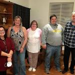 Sequim city council candidates  from left, Rachel Anderson, Vicki Lowe, Kathy Downer, Brandon Janisse and Lowell Rathbun  gather for a photo-op about an hour after 2021 General Election results were announced on Nov. 2. The quintet out-paced their opponents to hold leads in the election. Sequim Gazette photo by Matthew Nash
