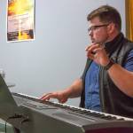 Mark Lorentzen, musical director for the All Together Now! show, an international musical theatre fundraiser which his nonprofit Ghostlight Productions will participate in during the weekend of Nov. 12-14, leads a rehearsal with the 13-member cast. Sequim Gazette photo by Emily Matthiessen