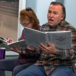Ron Graham belts out a tune about a dream during a Ghostlight Productions rehearsal for an upcoming livestream fundraising performance. Behind him, Angela Poynter checks her binder. Sequim Gazette photo by Emily Matthiessen