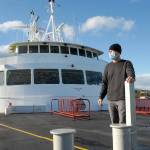 Rian Anderson, Port Angeles district manager for Black Ball Ferry Line, stands on the forward deck of the MV Coho, which resumed daily journeys across the Strait of Juan de Fuca on Nov 8  20 months after it was docked by international border restrictions due to COVID-19. Photo by Keith Thorpe/Olympic Peninsula News Group
