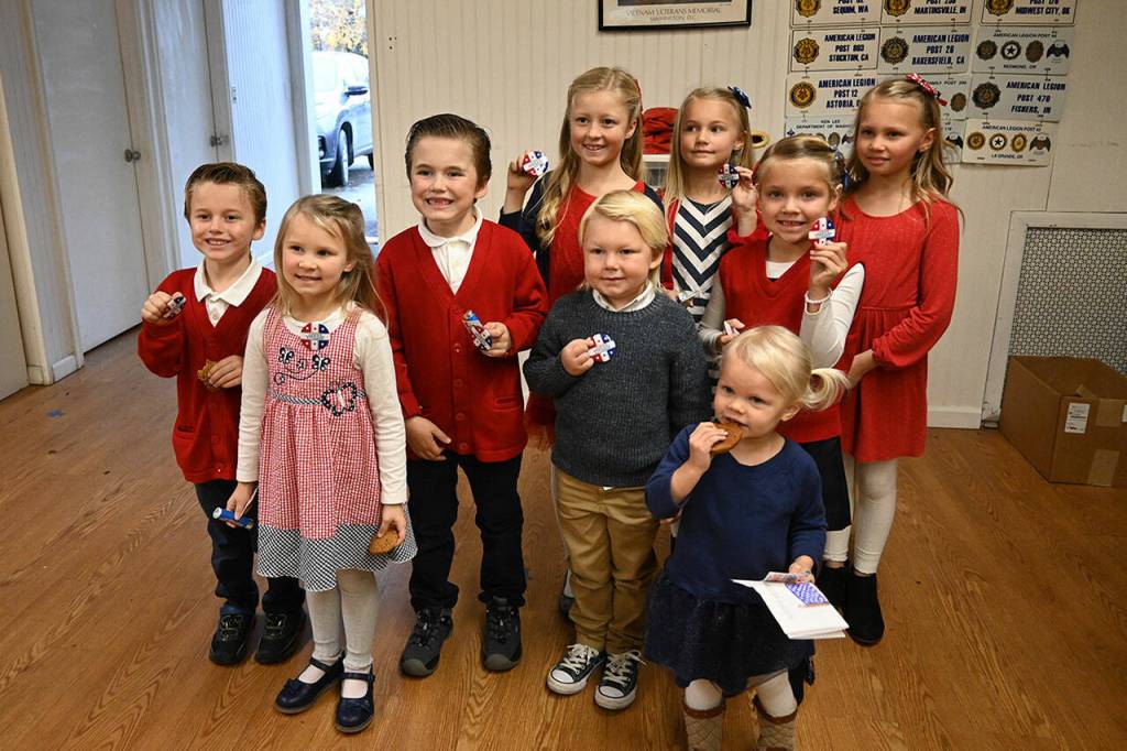 Young members of the Junior American Citizens club pose for a photo following the Veterans Day ceremony at the American Legion Post 26 on Nov. 11. Sequim Gazette photo by Michael Dashiell