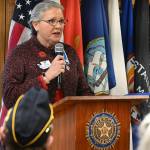 Judy Tordini, representing the Michael Trebert Chapter of the Daughters of the American Revolution, leads a recognition of the 100th anniversary of the Tomb of the Unknown Soldier, at last weeks Veterans Day ceremony at American Legion Jack Grennan Post No. 26. Sequim Gazette photo by Michael Dashiell