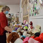 Philomena Lund, co-chair of Toys for Sequim Kids, places stuffed animals among thousands of toys given to local families in-need in 2020. Organizers seek more toys, clothes and other items for children from babies to 18 for the Dec. 15 event this year. Sequim Gazette file photo by Matthew Nash