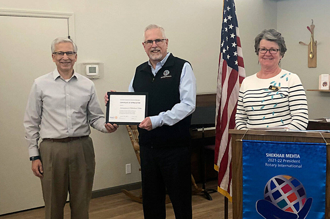 Brent Simcosky, Jamestown SKlallam Tribes director of Health Services, in center, accepts the Rotary Foundation Certificate of Appreciation on Nov. 12, from Eric Lewis and Ann Flack, president of the Sequim Sunrise Rotary. Photo courtesy of Sequim Sunrise Rotary