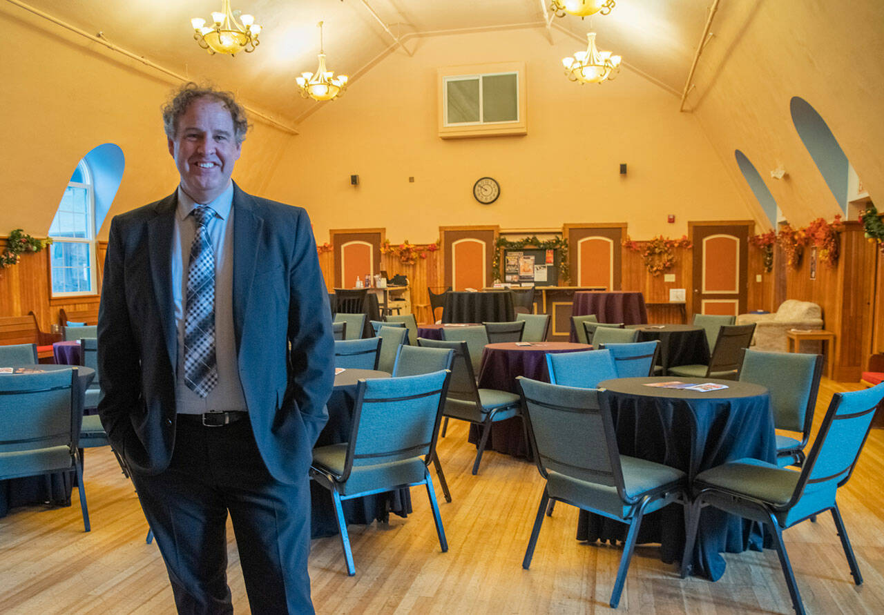 David Herbelin, Olympic Theatre Arts new executive manager, has a big vision for the future of the theater in the community. Herbelin, seen here standing in the OTA Gathering Hall, says the job draws on all his past experience, educationally and professionally. Sequim Gazette photo by Emily Matthiessen