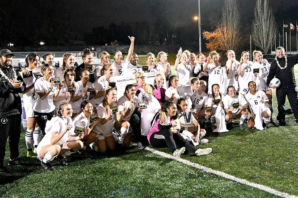 The Peninsula College womens soccer team celebrates its NWAC Championship in Tukwila on Nov, 14. Photo by Jay Cline/Peninsula College