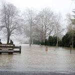 The waters of Lake Pleasant flooded the Lake Pleasant County Park on Monday. The water runs over the West Lake Pleasant Road and into neighboring homes. Photo by Lonnie Archibald/for Peninsula Daily News