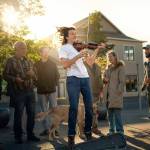 Marina Shipovas photograph of a young violinist playing at Centennial Place is one of a series the peninsula photographer created as part of the Sequim Understory Project. Shipova will be outside the Sequim Civic Center from 1-3 p.m. Saturday, Nov. 27, as a part of the Art Beat event. Photo by Marina Shipova