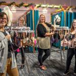 Kelly Iriye, Penny Hooker, owner Sarah Nightingale, and Maggie Bettger show some of the stock found at Northwest Bras, a fit-focused undergarment, lingerie and swimwear shop located at 755 West Washington Street Suite E. Sequim Gazette photo by Emily Matthiessen