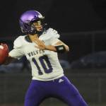 Sequim quarterback Lars Wiker looks for a receiver in the first half of the Wolves 35-29 loss at Bremerton on Sept. 30. Wiker had three touchdown passes. Sequim Gazette photo by Michael Dashiell