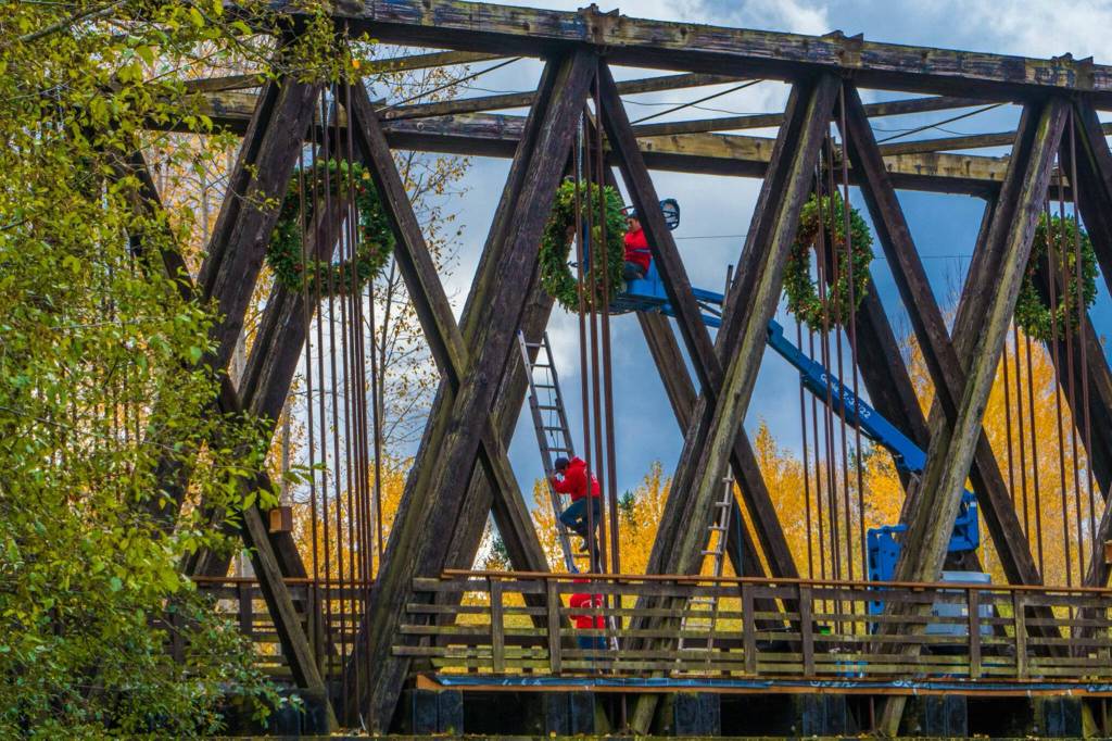 Crews with P. Walker Inc. began installing Christmas lights and decorations in October at Jamestown SKlallam Tribes properties including along the Dungeness River Railroad Bridge. In total, there are more than 3 million lights between the sites. Photo courtesy of Patrick Walker