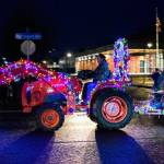 Sequim High teacher/FFA advisor Bill McFarlen drives a tractor past the Sequim Civic Center during the annual Sequim Museum Tractor Cruise on Nov. 27. Sequim Gazette photo by Emily Matthiessen