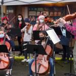 Members of Sequim Community Orchestra plays holiday favorites at Home Town Holidays in Centennial Place with youth from their Strings Program. Strings instructor Teresa Herman teaches violin, viola, cello and base to local children under the auspices of the Orchestra. Sequim Gazette photo by Emily Matthiessen