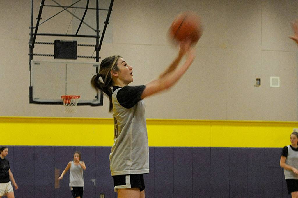 Lauryn Stephens goes for a 3-pointer in a recent practice for the Sequim girls varsity basketball squad. Sequim Gazette photo by Matthew Nash