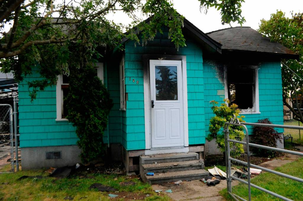 Five people escaped a house fire at 153 W. Spruce St. in June with no injuries. No criminal charges were filed but all five people have temporary housing situations, said property owner Ron Fairclough. Sequim Gazette file photo by Matthew Nash