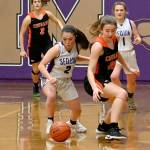 Sequim guard Hannah Bates, left, steals the ball from Central Kitsaps Abi Lundblad in the Wolves home game against CKs Cougars on Dec. 13. Sequim Gazette photo by Michael Dashiell