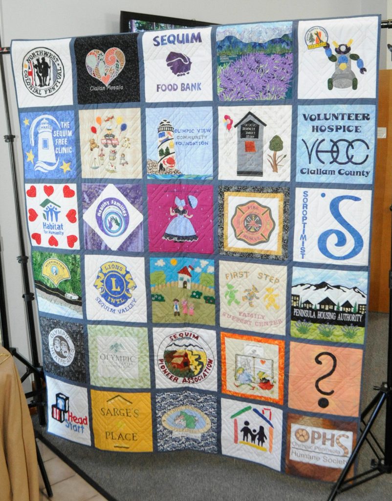 This new community service quilt features a block of each agency the Sunbonnet Sue Quilt Club supports through its various quilt donations and raffles.