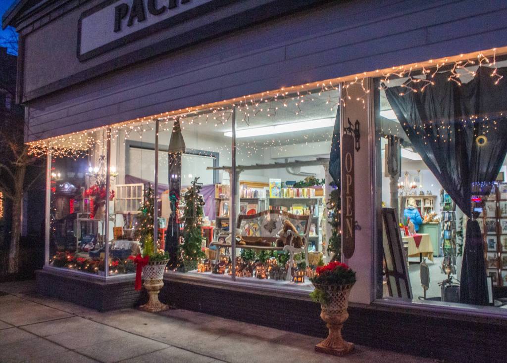 The exterior of Pacific Mist Bookstore on 122 West Washington Street glows in the December evening light. Sequim Gazette photo by Emily Matthiessen
