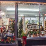 The exterior of the newly re-opened Pacific Mist reveals some of the contents of the book, gift and card store. Sequim Gazette photo by Emily Matthiessen