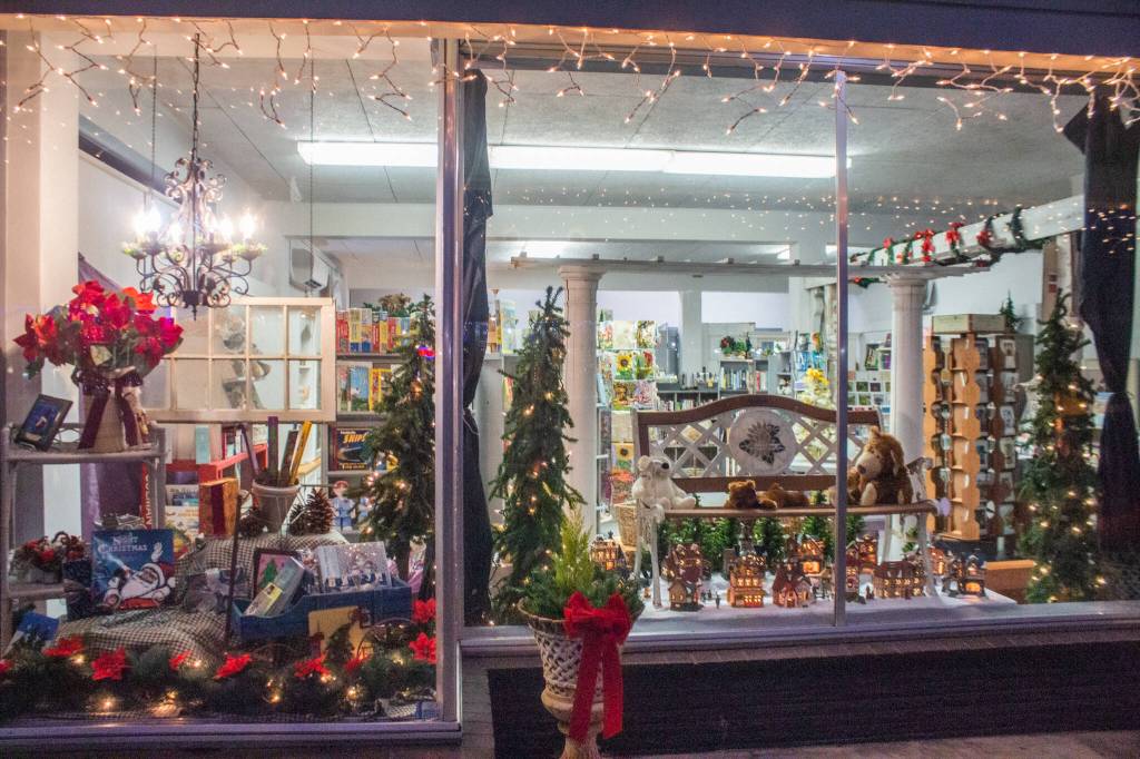 The exterior of the newly re-opened Pacific Mist reveals some of the contents of the book, gift and card store. Sequim Gazette photo by Emily Matthiessen