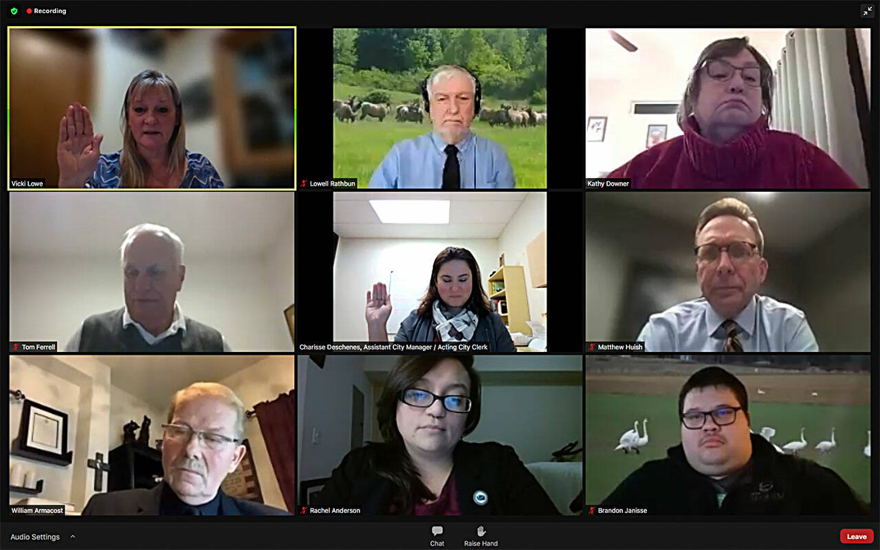 On Monday night, newly elected and reelected Sequim city councilors were sworn into office along at their first official meeting on Dec. 13. Pictured are, from top left, Vicki Lowe, Lowell Rathbun, Kathy Downer; middle left, deputy mayor Tom Ferrell, assistant city manager Charisse Deschenes, city manager Matt Huish; bottom left, mayor William Armacost, Rachel Anderson, and Brandon Janisse. Huish was officially sworn in, too. Photo courtesy of City of Sequim