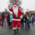 Santa, aka Stephen Rosales, waves to visitors of the Home Town Holidays event last month. Sequim Gazette photo by Emily Matthiessen