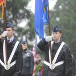 Jackson Imholt and Faith Amaya of the Civil Air Patrol-Dungeness Composite Flight present colors at the Wreaths Across America ceremony in Sequim Saturday morning. Sequim Gazette photo by Michael Dashiell