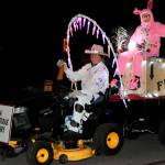 Gary and Sylvia Stanton ride through Sunland on their A Christmas Story float on Dec. 19. Sequim Gazette photo by Matthew Nash