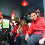 Sequim seventh-graders Michael Lusk, far left, and Kingston Stevens, pictured here with Scott and Laura Lee Johnson, enjoy a ride home in a firetruck in mid-December, thanks to Peninsula Behavioral Health's “Adventure Auction” on Nov. 6. The auction saw "adventures," rather than items, auctioned off to raise funds for the entity. Auction items included a helicopter flight, guided hikes and fishing trips. In Port Angeles, a preschool student got a ride to class in a fire truck. Sequim Gazette photo by Michael Dashiell