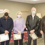 Submitted photo
JooRi Jun, executive director for Volunteer Hospice of Clallam County (far left) and board president Peter Raiswell (far right) honor outgoing board members (from left) Dave Gilbert, Nancy Bargar and Ed Hopfner.