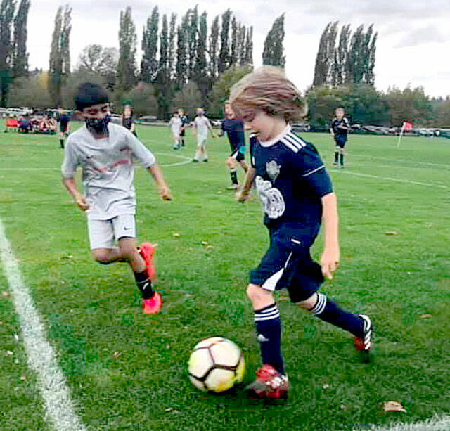 Miles Fradkin of Team Typhoons, a Storm King FC Boys 2012 (U-10) team, advances the ball downfield. Photo courtesy of Storm King FC