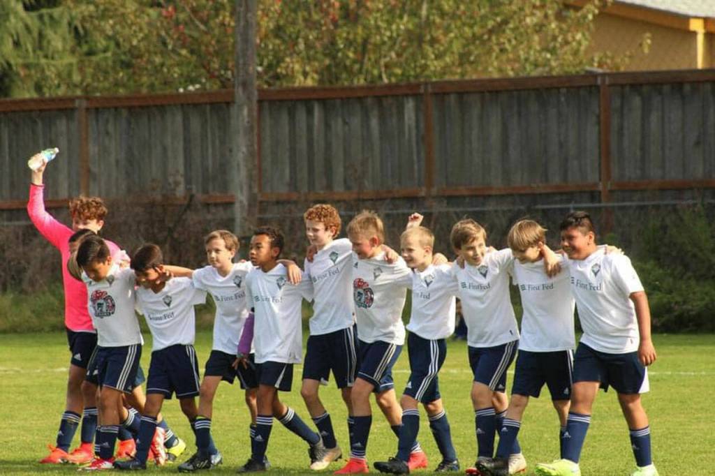 Storm King FC's Team Bandits, a Boys 2010 (U-12) team, celebrates a win at the squad's home field in Agnew. Photo courtesy of Storm King FC
