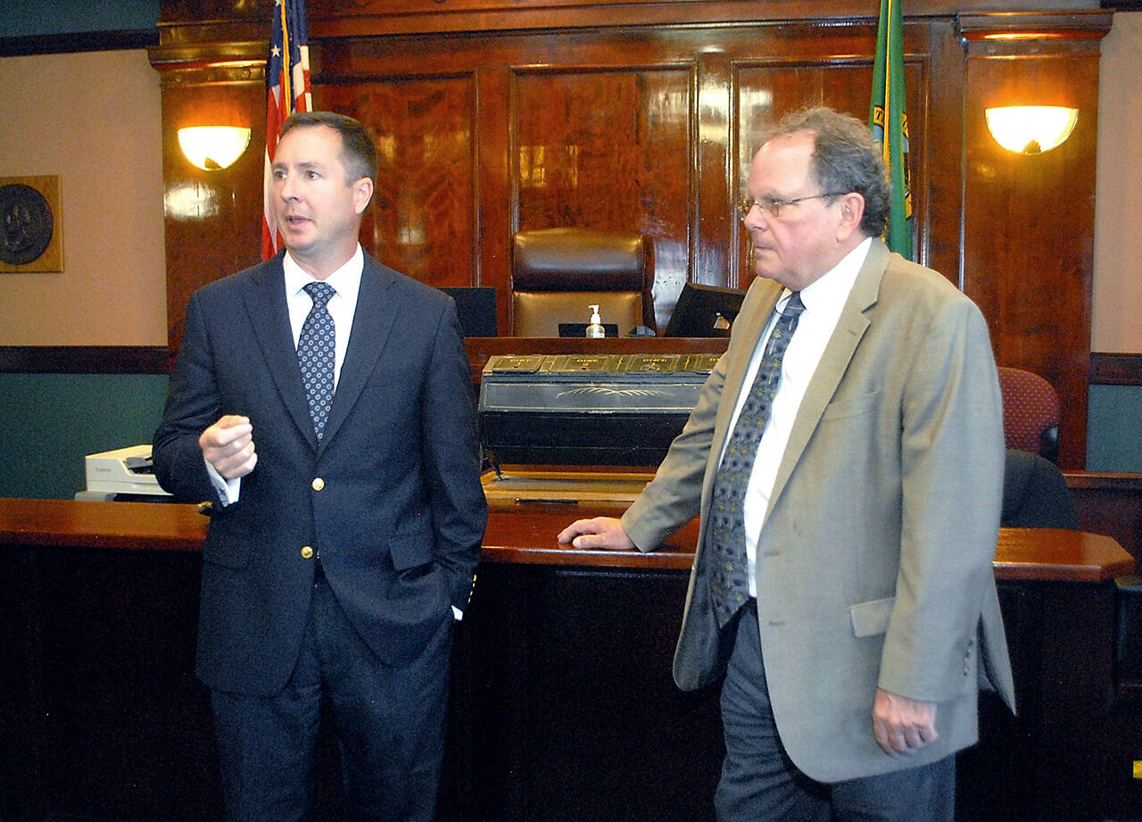 File photo by Keith Thorpe/Olympic Peninsula News Group
Clallam County Prosecuting Attorney Bill Nichols, left, accompanied by District Court Judge Dave Neupert, talks about a proposed mental health court program at the Clallam County Courthouse in Port Angeles in July. The court received a $231,000 grant to establish and operate a mental health therapeutic court.