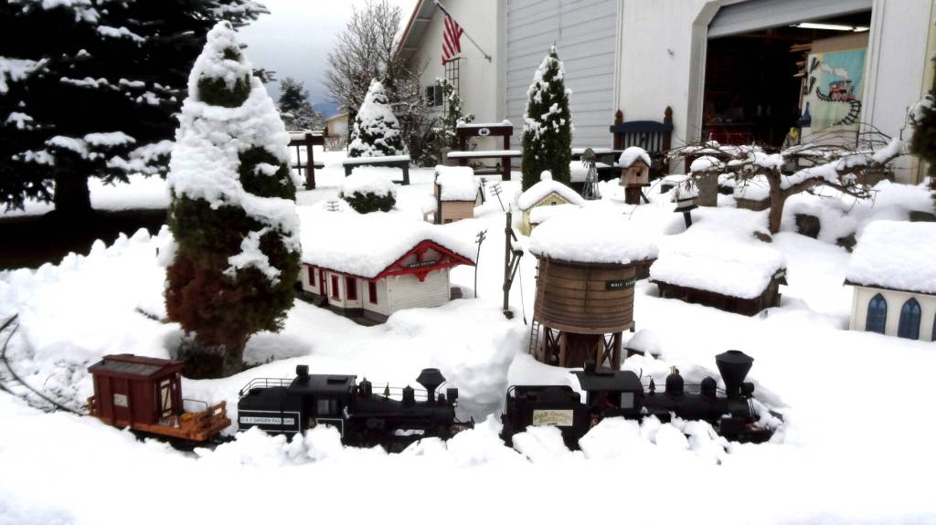 Submitted photo
Sequims Dick Wolf brings out his train to plow his backyard tracks at his D&E Railroad following the recent snow.
