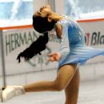 Danica Sebastian, 12, of Bremerton, a member of the Bremerton Figure Skaters Club, gives a skating demonstration on Tuesday at the Winter Ice Village in downtown Port Angeles. Club members put on a four-routine performance of songs featured in their recent holiday show in Bremerton. The Port Angeles skating rink is open daily from 9 a.m. to 9 p.m. with breaks for ice resurfacing through Jan. 3. (Keith Thorpe/Peninsula Daily News)