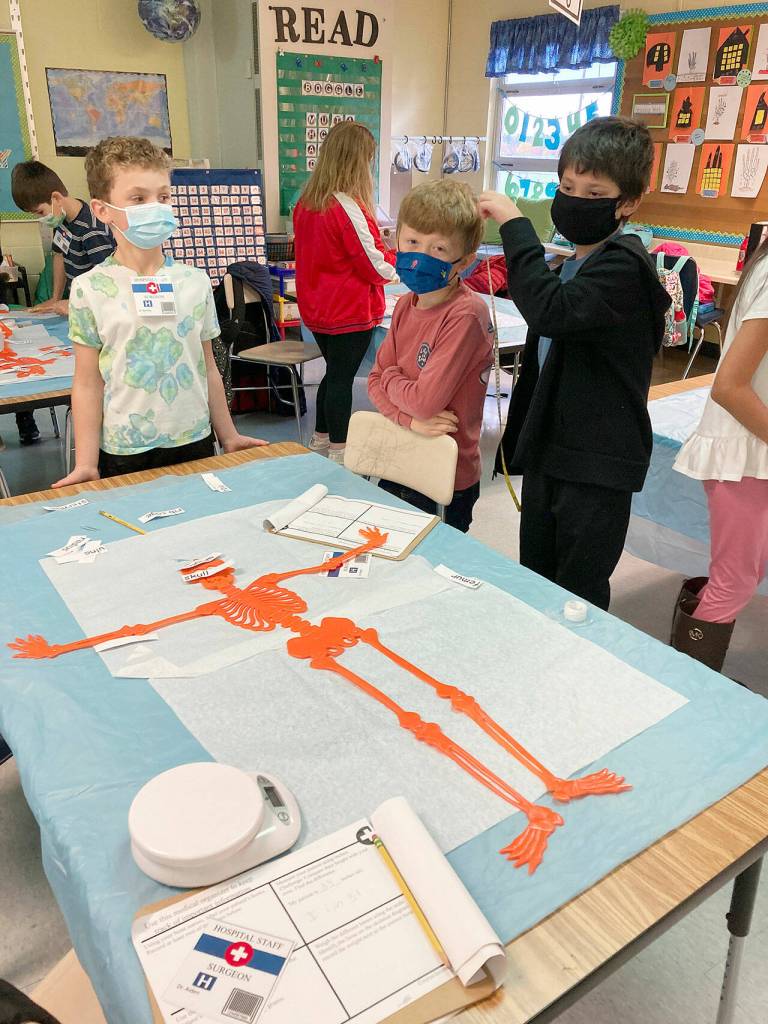 From left, Bentley Berry, Aiden Fazio and Walter Thomas  third-graders in Emily Ellefsons class at Helen Haller Elementary  learn about the central nervous system and brain. Submitted photo