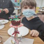 Students in Heather Rileys class earn Fun Day Friday through positive behavior in the classroom and task completion; they recently voted for Culinary Delight. Here, student Christian Furnish shows off a cupcake. Submitted photo