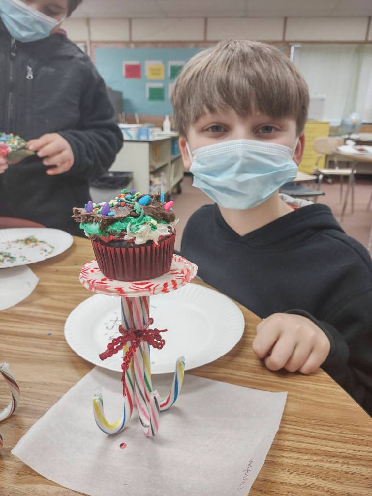 Students in Heather Rileys class earn Fun Day Friday through positive behavior in the classroom and task completion; they recently voted for Culinary Delight. Here, student Christian Furnish shows off a cupcake. Submitted photo