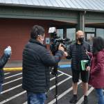 CNN's senior national correspondent Kyung Lah interviews Sequim mayor William Armacost after a Coffee with the Mayor session on Jan. 28 about QAnon as producer Kim Berryman and photojournalist Taka Yokoyama and record the conversation that appeared on a segment of "Anderson Cooper 360" the next night. Armacost said he never publicly supported QAnon. Sequim Gazette photo by Matthew Nash