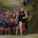 Sequims Riley Pyeatt leads the pack at the outset of an Olympic League meet on Sept. 29 at the Dungeness Recreation Area. Pyeatt cruised to a win by nearly 50 seconds. Sequim Gazette photo by Michael Dashiell