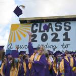 Class of 2021 Sequim High seniors toss caps into the air after completing their graduation ceremony on June 11. Sequim Gazette photo by Michael Dashiell