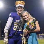 Sequim Gazette photo by Michael Dashiell
Sequim Highs Homecoming King and Queen, Pryce Glasser and Alex Schmadeke, smile for the crowd at the Homecoming game halftime festivities Oct. 16.
