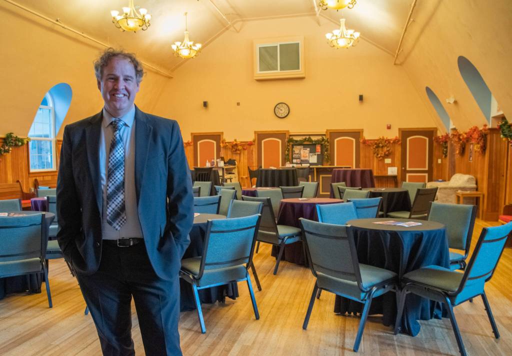 David Herbelin, Olympic Theatre Arts new executive manager, has a big vision for the future of the theater in the community. Herbelin, seen here standing in the Olympic Theatre Arts Gathering Hall in November, says the job draws on all his past experience, educationally and professionally. Sequim Gazette photo by Emily Matthiessen
