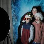 With lights and music throughout the courtyard, Helen Haller Elementarys Parent Teacher Organization hosted a Winter Wonderland on Dec. 16 with lights, popcorn, music, hot cocoa, a photo booth and an appearance by Santa Claus. Here, Samantha Rossi takes a selfie with her daughters Olive and Elliana. Sequim Gazette photo by Matthew Nash