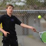 Sequims Garrett Little, pictured here as a freshman returning a shot against a North Mason foe on May 10, took Olympic League titles twice in 2021. Sequim Gazette photo by Michael Dashiell
